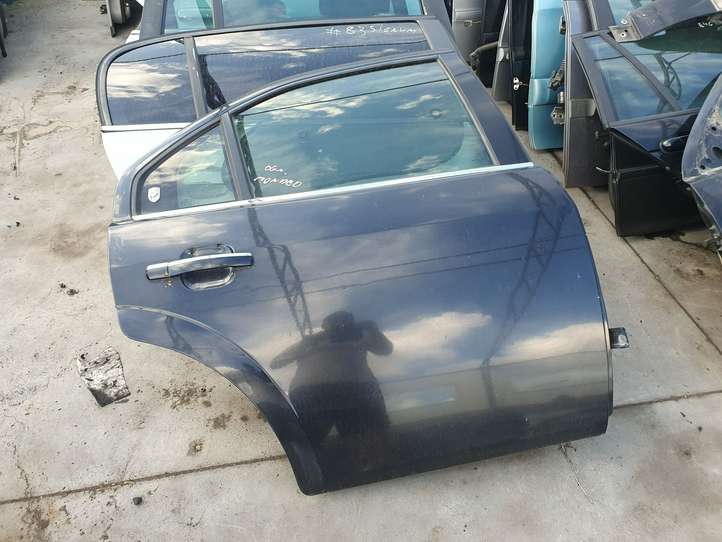 Ford Mondeo Mk III (2000 - 2007)   Задняя дверь