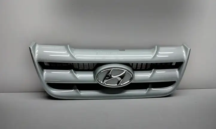 Hyundai Matrix (2001 - 2005) 8636117010 Верхняя решетка радиатора — фото 1