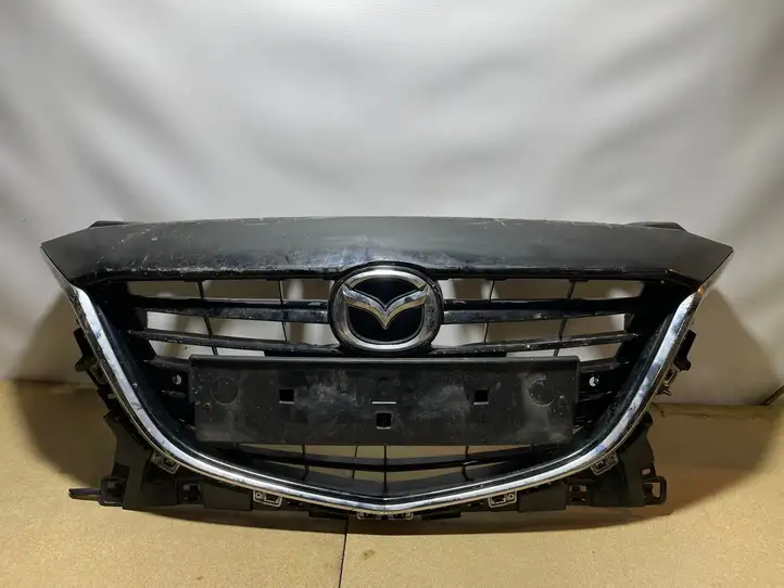 Mazda 3 II (2013 - 2017) BJE50712 Верхняя решетка радиатора — фото 1