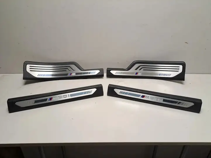 BMW X7 G07 (2018 - ) 7434239 Внутренняя обшивка порога (комплект) — фото 1