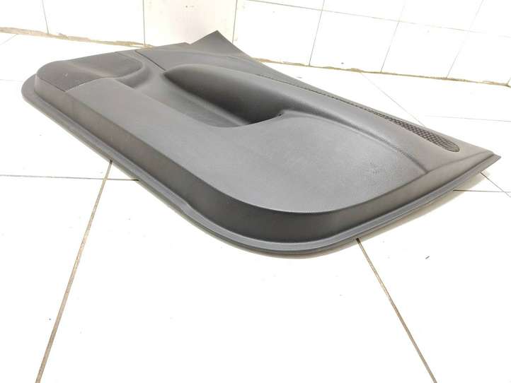 Nissan Note (E11) (2006 - 2014)  809229U000 Обшивка передней двери