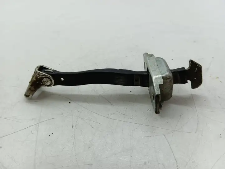Toyota Yaris (2009 - 2012) Ограничитель задней двери — фото 1