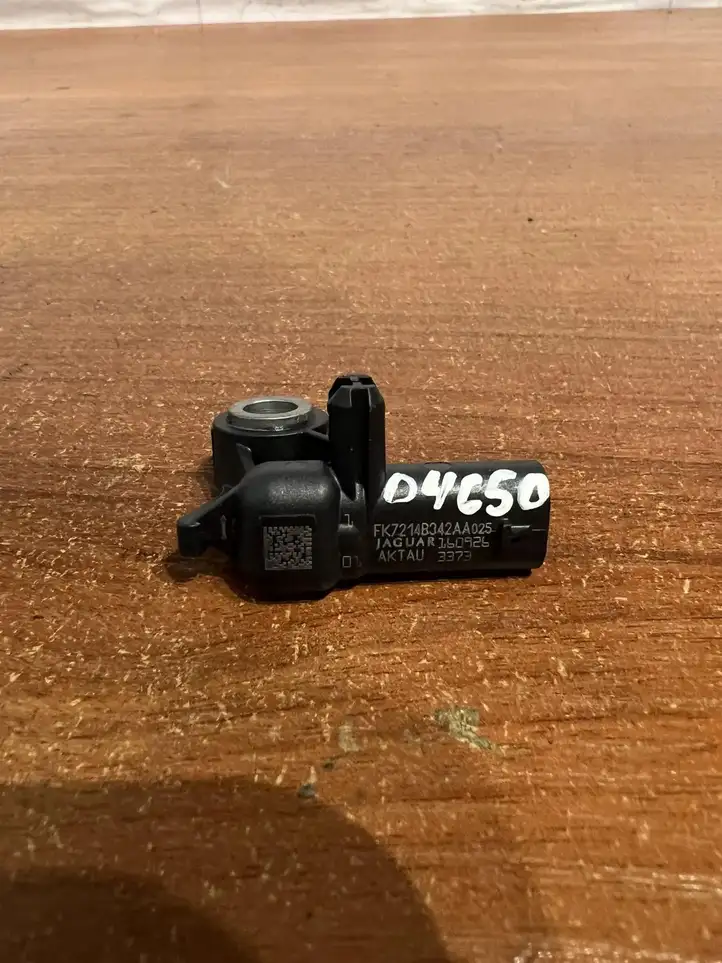 Jaguar XE (2014 - 2019)  FK7214B342AA Датчик удара надувных подушек