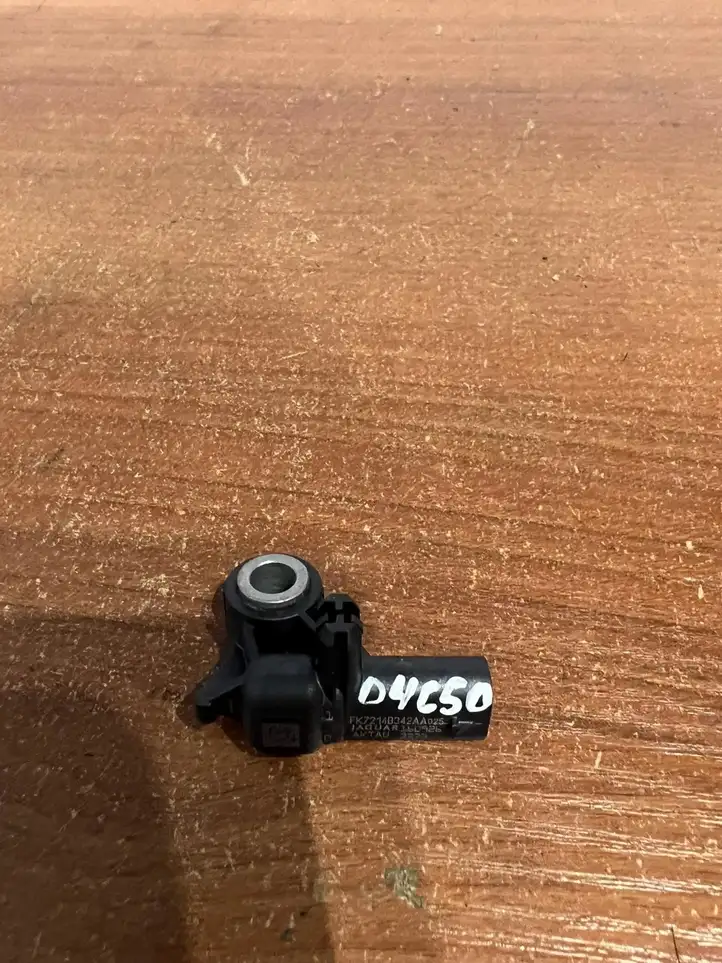 Jaguar XE (2014 - 2019)  FK7214B342AA Датчик удара надувных подушек