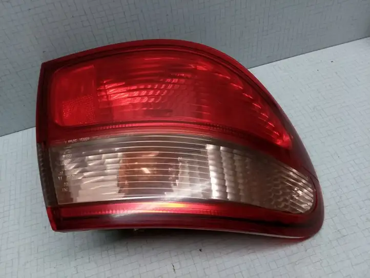 Nissan Almera N16 (2000 - 2010) ICHIKOH4880A Задний фонарь в кузове — фото 1