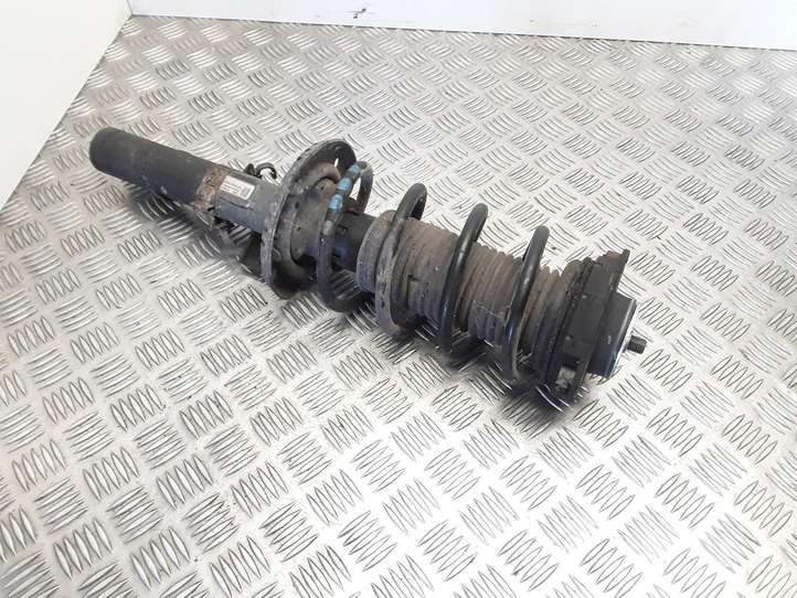 Volkswagen Polo (2005 - 2009)  6Q0413031CD Передний амортизатор с пружиной