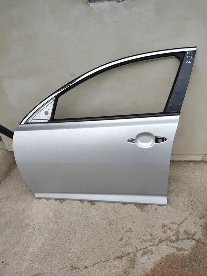 Kia Optima (2010 - 2013) Дверь — фото 1