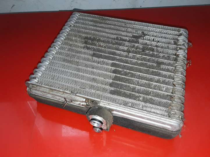 Subaru Justy (2003 - 2007)  9541083E10 Радиатор кондиционера воздуха (в салоне)