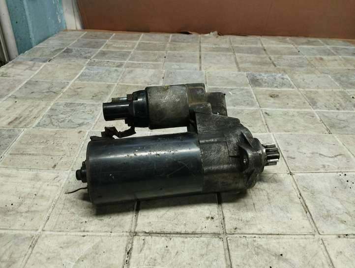Volkswagen PASSAT B6 (2005 - 2010)  02E911023H Стартер