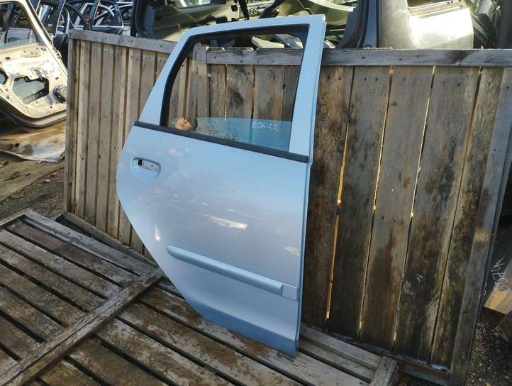 Mitsubishi Colt (2004 - 2008)   Задняя дверь