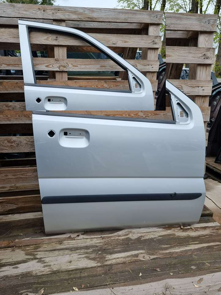 Subaru Justy (2003 - 2007)   Дверь