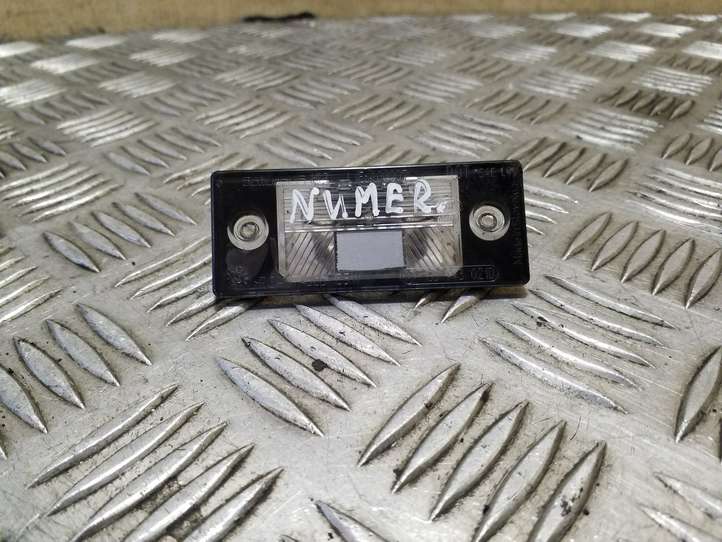 Volkswagen Tiguan (2007 - 2011)  1J5943021D Освещение номера