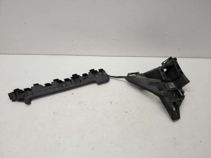 Opel Astra (2009 - 2012)  13266753  Держатель заднего бампера (кронштейн)