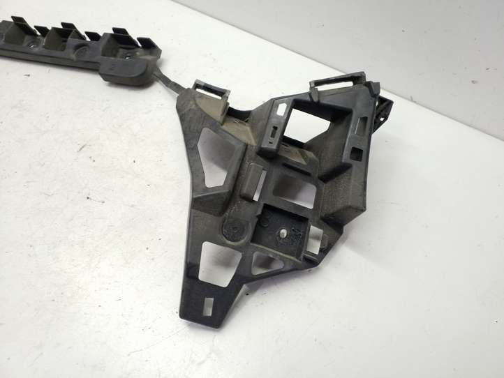 Opel Astra (2009 - 2012)  13266753  Держатель заднего бампера (кронштейн)