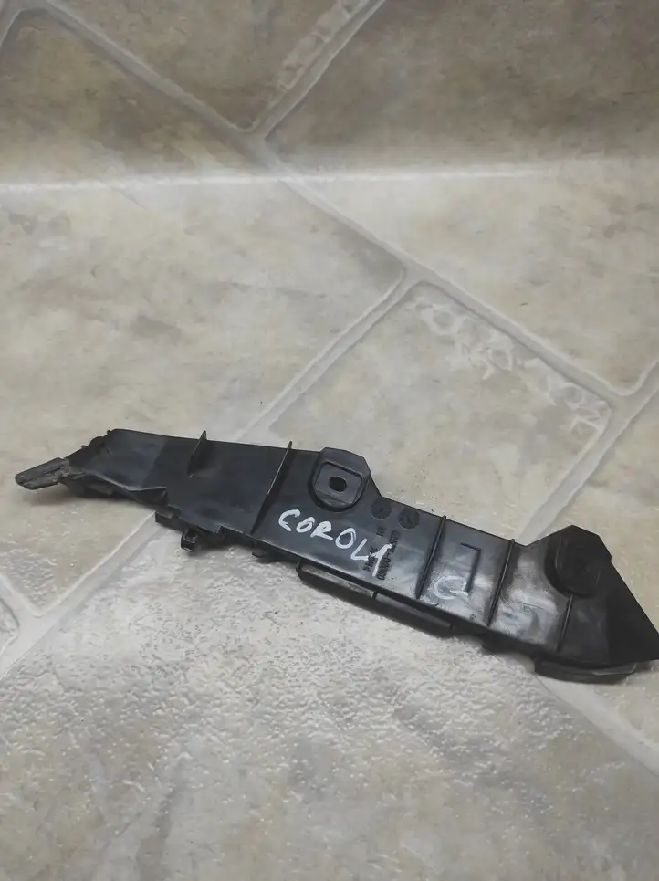 Toyota Corolla Verso AR10 (2004 - 2009) 5257602060 Кронштейн заднего бампера — фото 1