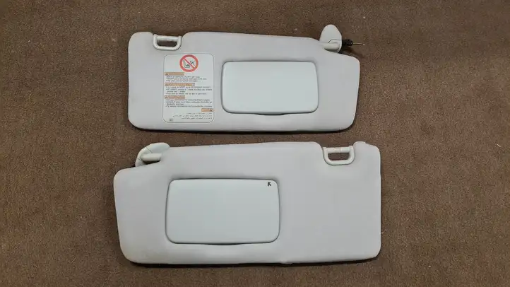 Subaru Outback (2003 - 2007) 92011AG Солнцезащитный козырек — фото 1