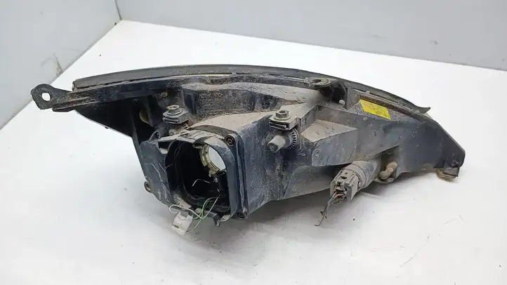 Ford Focus (1998 - 2004) Передняя фара — фото 2
