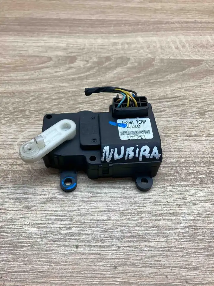 Daewoo Nubira (1995 - 2005) 06A25A1 Двигатель задвижки потока воздуха — фото 3