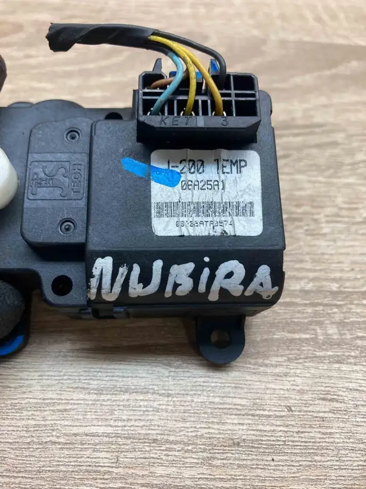 Daewoo Nubira (1995 - 2005) 06A25A1 Двигатель задвижки потока воздуха — фото 5