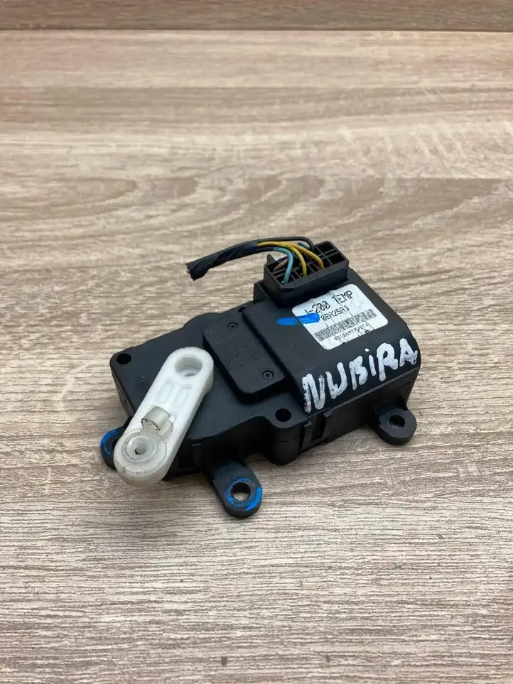 Daewoo Nubira (1995 - 2005) 06A25A1 Двигатель задвижки потока воздуха — фото 6