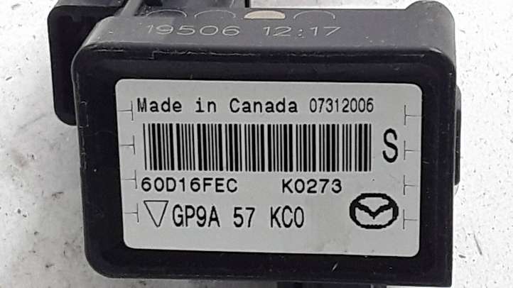 Mazda 6. (2005 - 2007)  GP9A57KC0 Датчик удара надувных подушек
