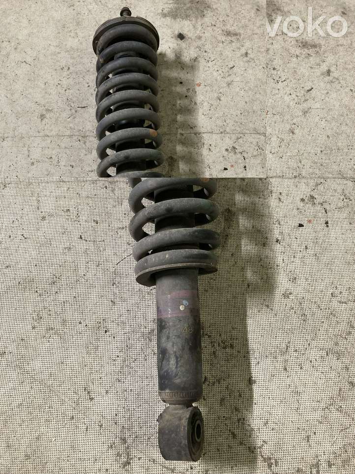 Toyota Land Cruiser (HDJ90) (1996 - 2002)  485106006 Передний амортизатор с пружиной