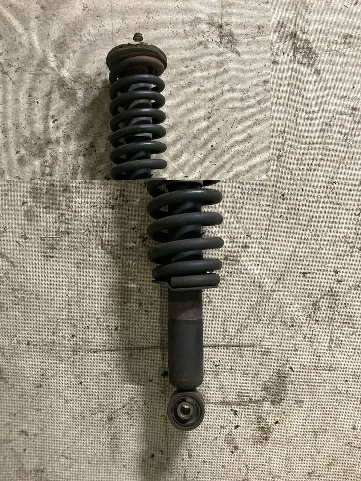Toyota Land Cruiser (HDJ90) (1996 - 2002)  485106006 Передний амортизатор с пружиной