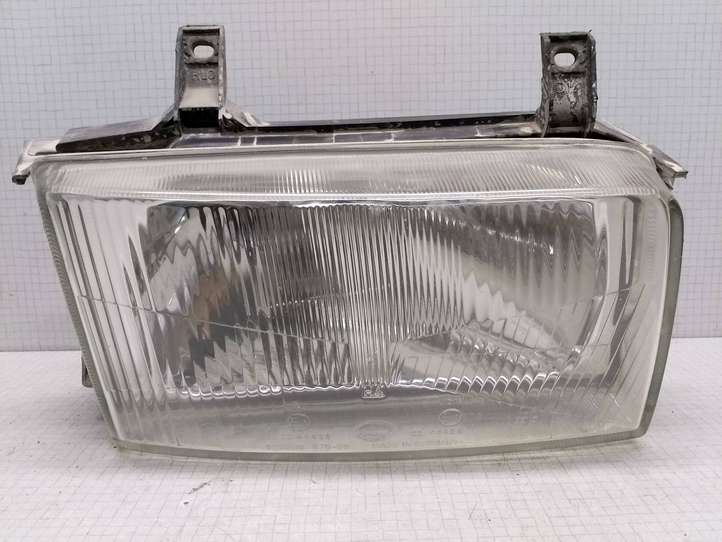 Volkswagen Transporter-Caravelle (1990 - 2003)  30210637000 Передняя фара