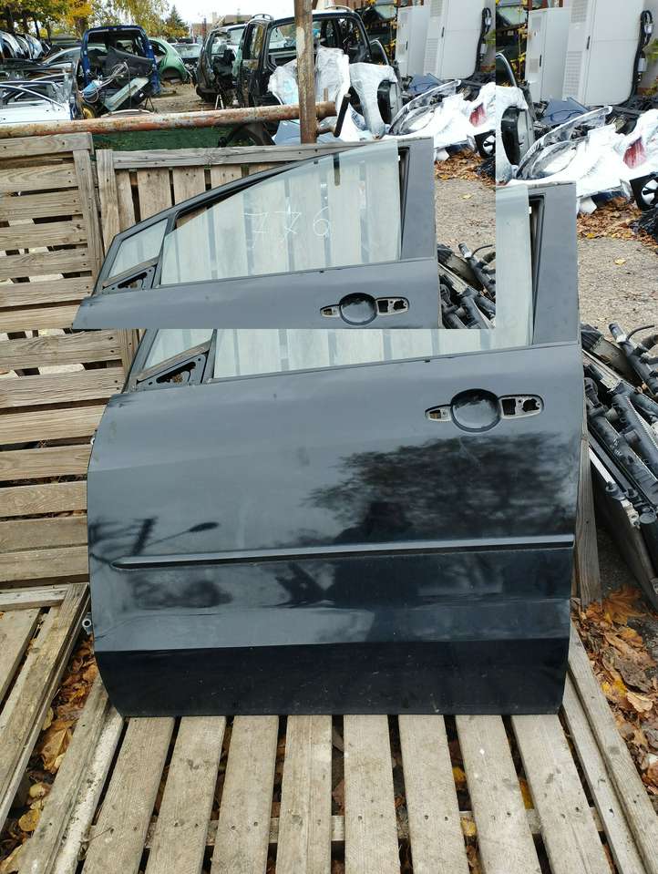 Mazda 5 (2005 - 2010)   Дверь