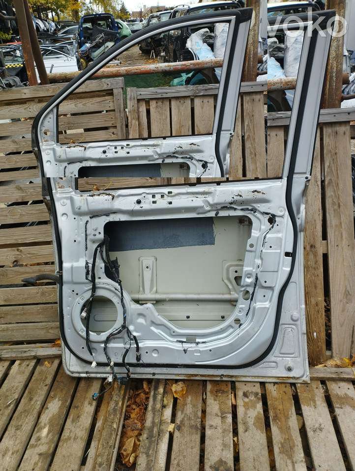 Kia Carnival (2006 - 2014)   Дверь