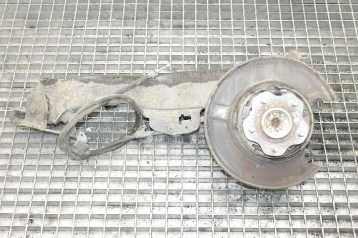 Nissan Qashqai (2010 - 2013)   Задний поворотный кулак (ступица, цапфа)