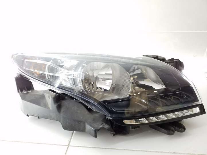 Renault Megane III (2009 - 2016)  260102973R Передняя фара
