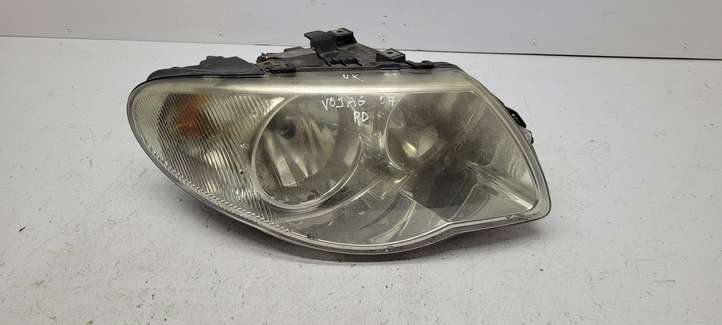 Chrysler Voyager (2004 - 2007)  04857832AC Передняя фара