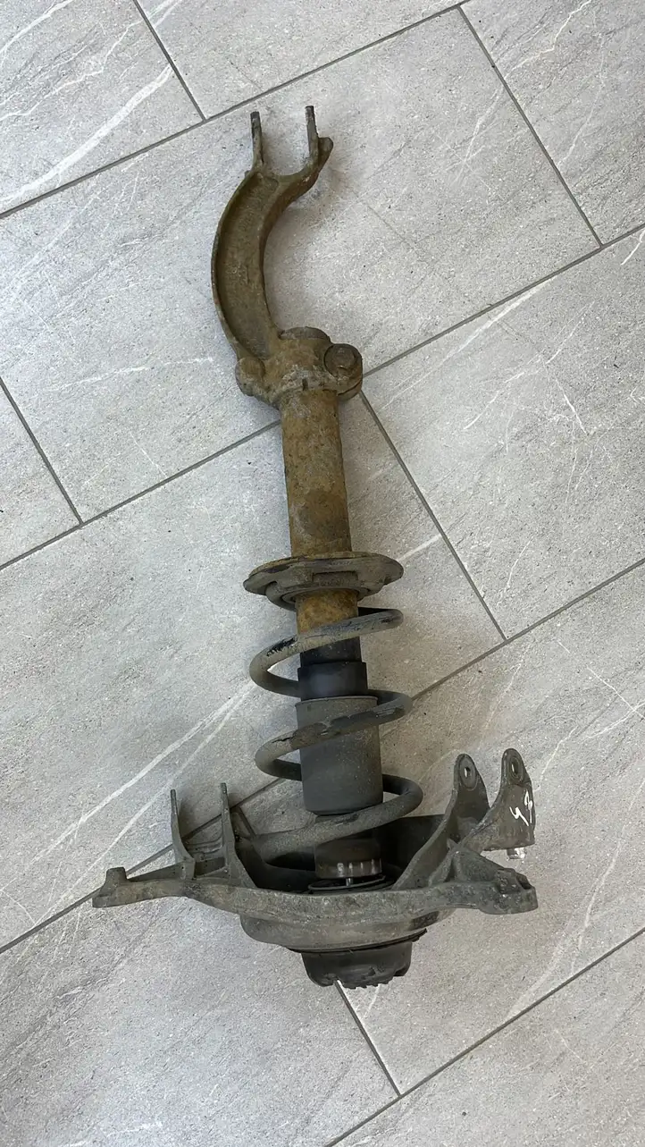 Audi A5 (2007 - 2011)   Передний амортизатор с пружиной