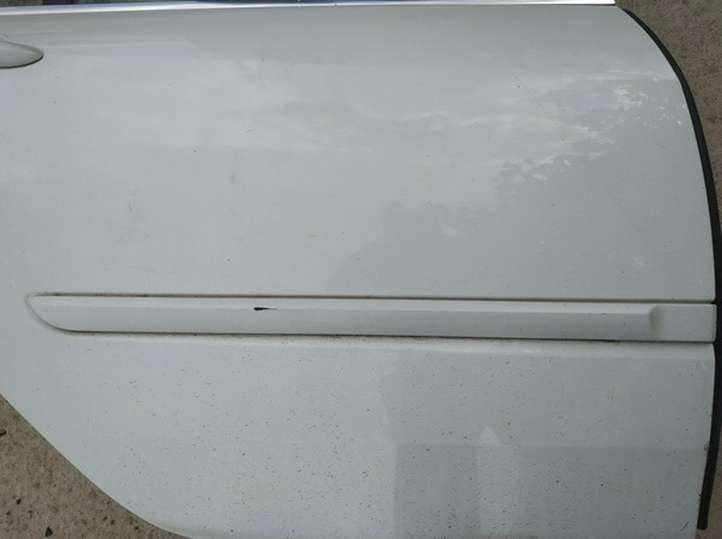 Renault Laguna (2007 - 2015)    Отделка дверей (молдинги) задней двери