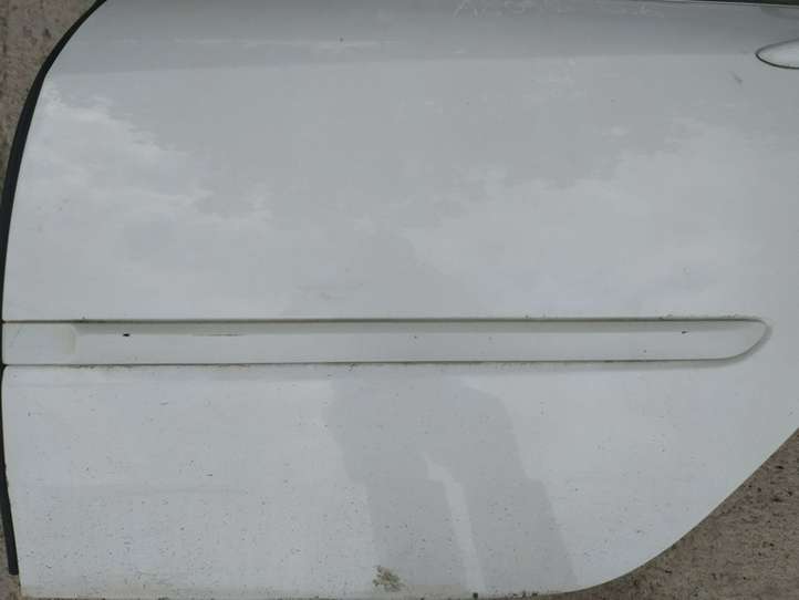 Renault Laguna (2007 - 2015)    Отделка дверей (молдинги) задней двери