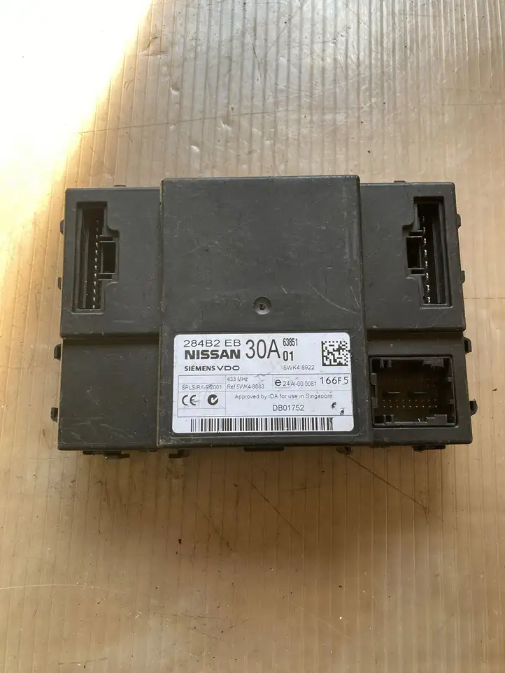 Nissan Navara D40 (2004 - 2015) 284B2EB30A Модуль комфорта — фото 1
