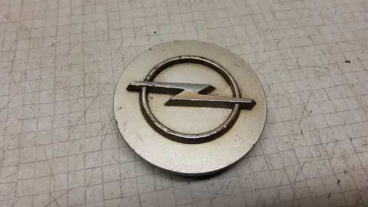 Opel Astra (1998 - 2004)  13117069MJ Заводская крышка (крышки) от центрального отверстия колеса