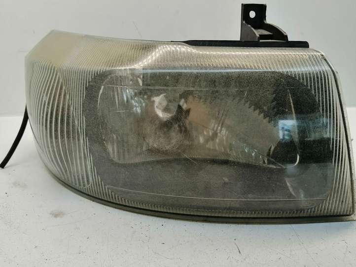 Ford Transit (2000 - 2006)  YC1513W029 Передняя фара