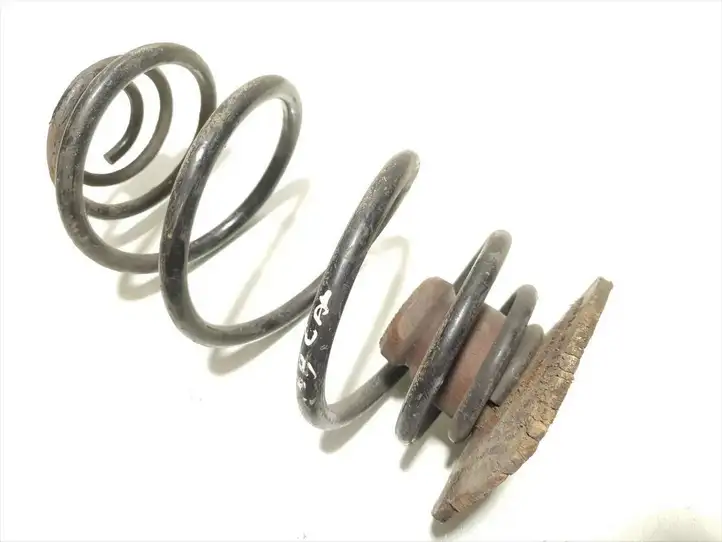 Opel Astra (2009 - 2012)   Пружина