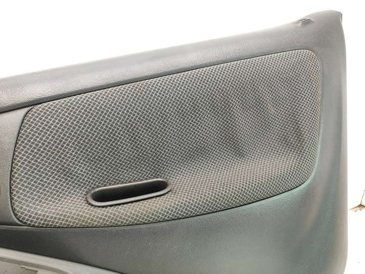 Toyota Yaris (2005 - 2009)  676110D010 Обшивка передней двери