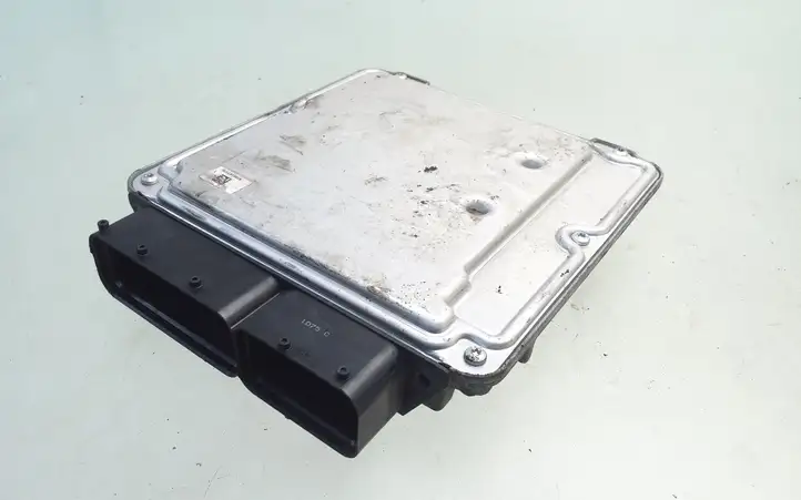 Volkswagen Touran I (2003 - 2010)  03G906016CD Блок управления двигателя