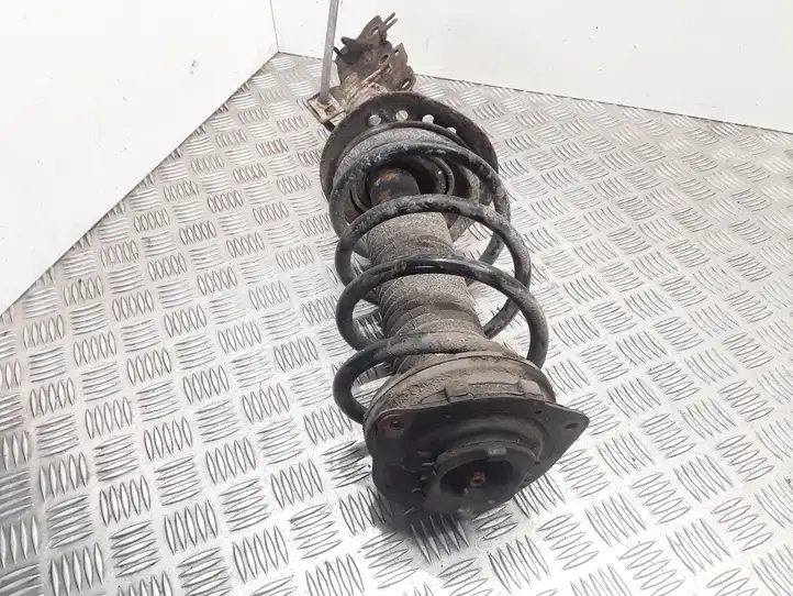 Nissan Qashqai (2006 - 2010)  54302JD03A Передний амортизатор с пружиной