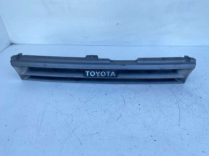 5210112660 Toyota Corolla E90 Grotelės priekinės