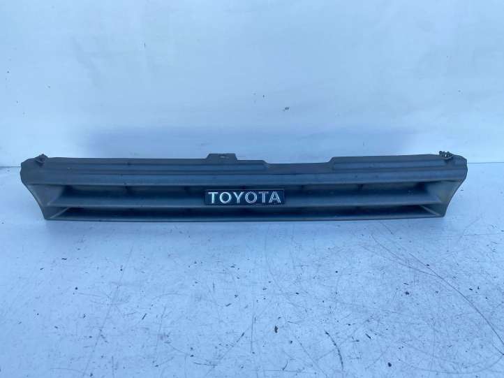 5210112660 Toyota Corolla E90 Grotelės priekinės