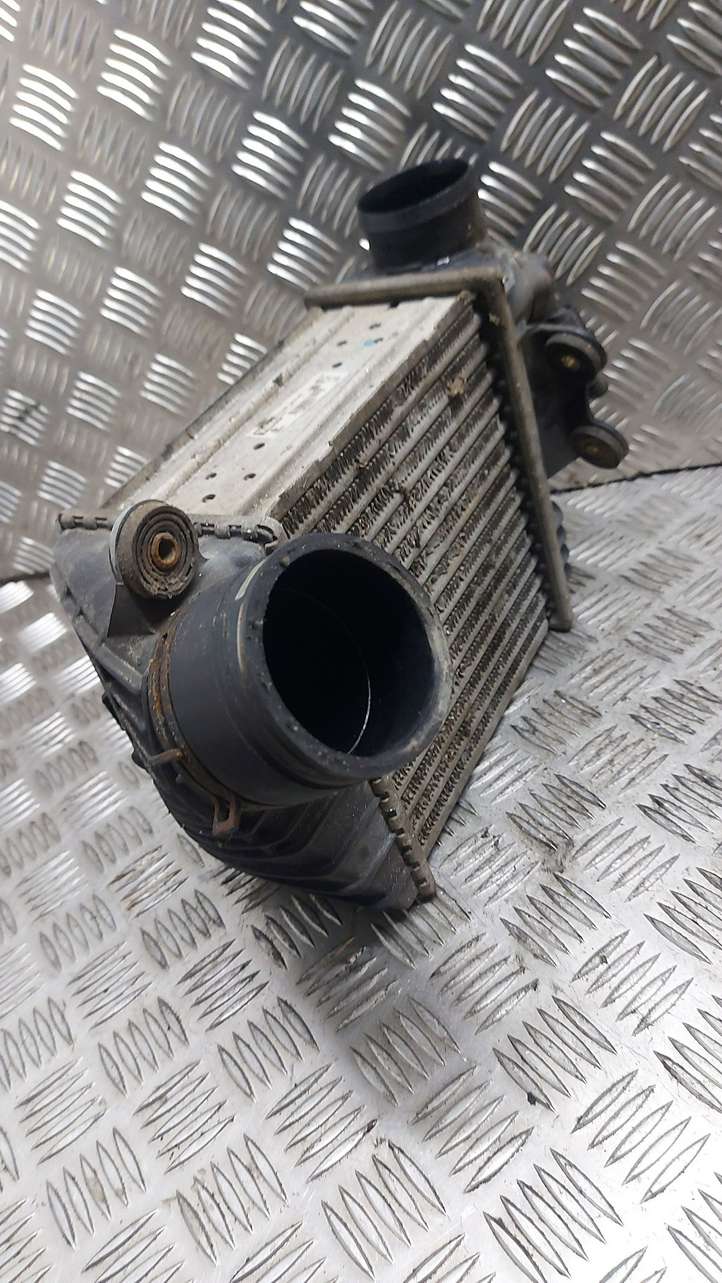 Volkswagen Golf IV (1998 - 2005)  1J0145803F Радиатор интеркулера
