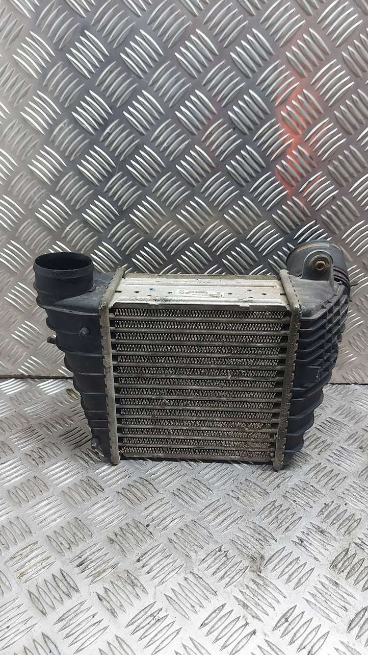 Volkswagen Golf IV (1998 - 2005)  1J0145803F Радиатор интеркулера