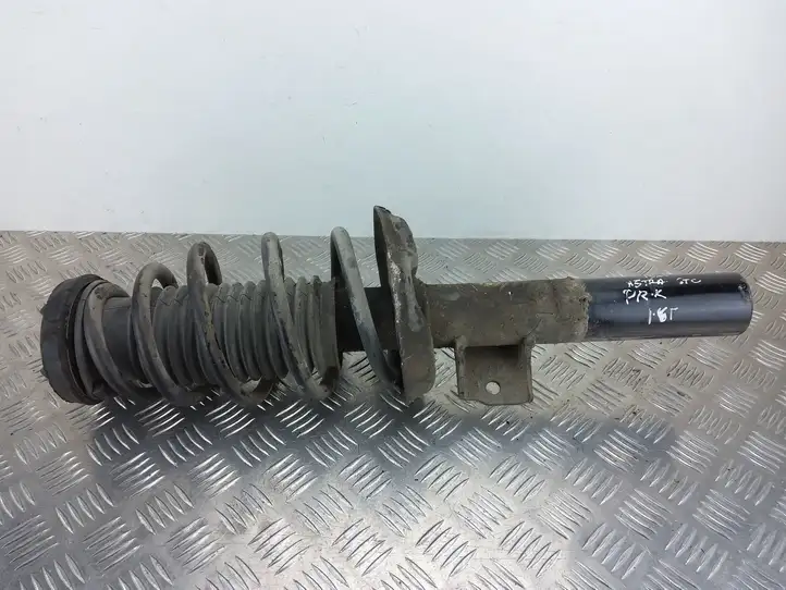 Opel Astra J (2009 - 2012) Передняя стойка амортизатора — фото 1