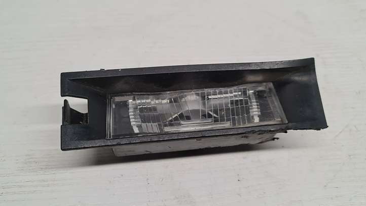 Fiat Punto (188) (1999 - 2010)  46532400 Освещение номера