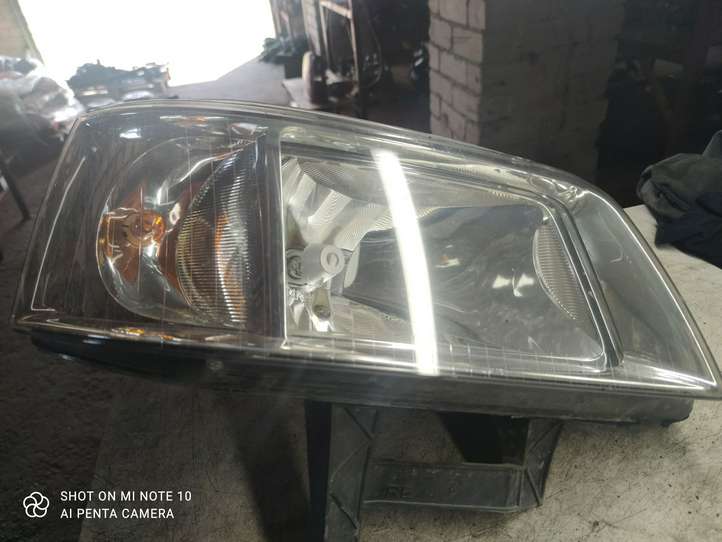 Volkswagen Transporter-Caravelle (2003 - 2009)  1305235738 Передняя фара